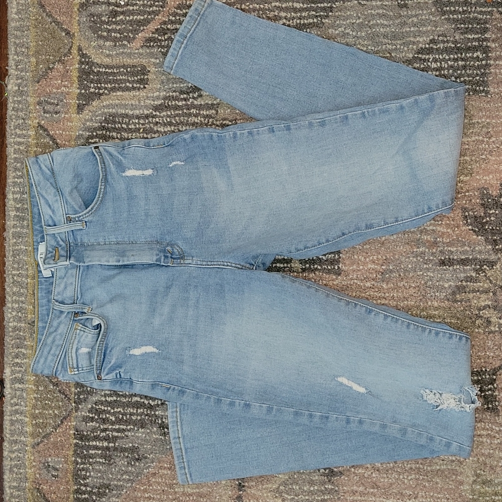 Light blue ripped jeans